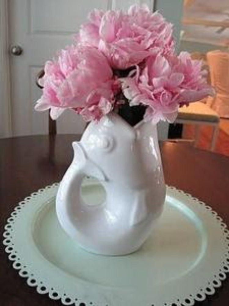Gurgle Pots - Fish Shaped Water Pitchers: Many years ago, Matt Ellison attended his brother’s wedding in France. All the guests were matched with French hosts, and his did not speak English, and he did not speak French. There were hours of awkward silence during their 3-4-hour dining experience. 